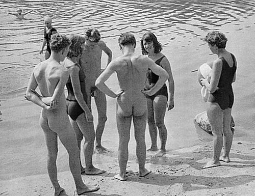 They wore one piece swim suits and the boys they taught were always nude. 