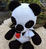 http://www.ravelry.com/patterns/library/the-panda-bear---amigurumi-crochet-pattern