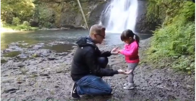 A Man Kneels Down To Ask His Girlfriend's Daughter If He Could Be His Father