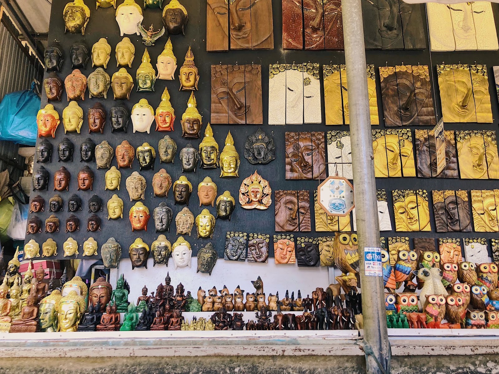 Wood carvings for sale in Damnoen Saduak Floating Market