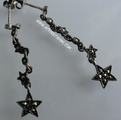 black metallic star earrings