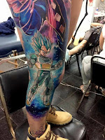 tatuaje vegeta en la pierna a color