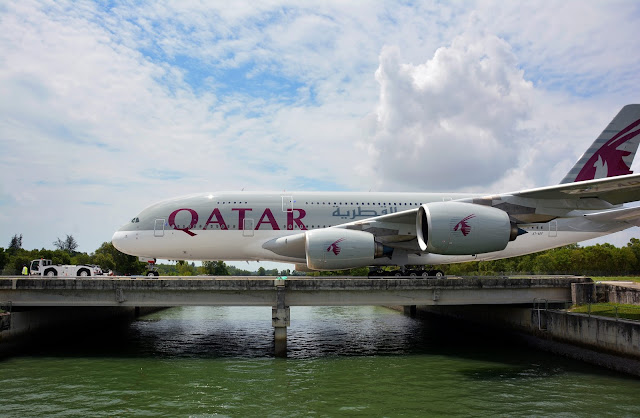 qatar airways a380-800 being towed