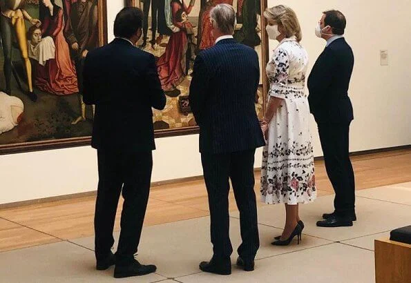 During her visit to the Old Masters Museum, Queen Mathilde wore a new floral print cotton shirt dress by Erdem