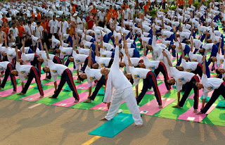 Narendra Modi leading the Yoga demonstration at Rajpath, Delhi