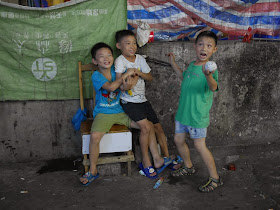 boys posing for a photo in Zhuhai, China