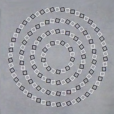 Bir spiral gibi iç içe geçmiş gibi görünen ve küçük kare kutulardan oluşan çemberler