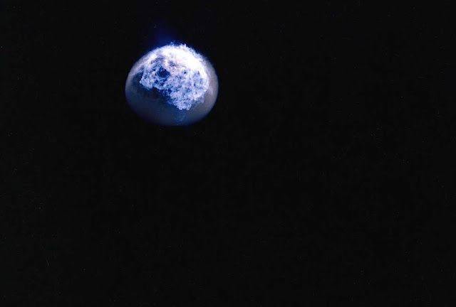Shot during Operation Fishbowl Bluegill, this is an image of an explosion of a 400-kiloton nuclear bomb taking place in the atmosphere, 30 miles above the Pacific, as viewed from above in October 1962.