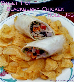 Sweet Hot Blackberry Chicken Roll Ups add plump fresh blackberries to chicken and vegetables in a sweet hot sauce for a beautiful and flavorful sandwich. | Recipe developed by www.BakingInATornado.com | #recipe #sandwich