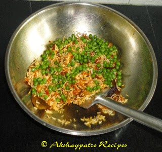 make a tempering and add rice, and green peas