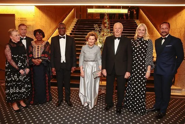 Crown Princess Mette-Marit wore Andrew Gn High-neck polka-dot print balloon-sleeve silk gown.  Denis Mukwege and Nadia Murad