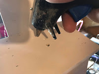 Applying hot glue to the top 