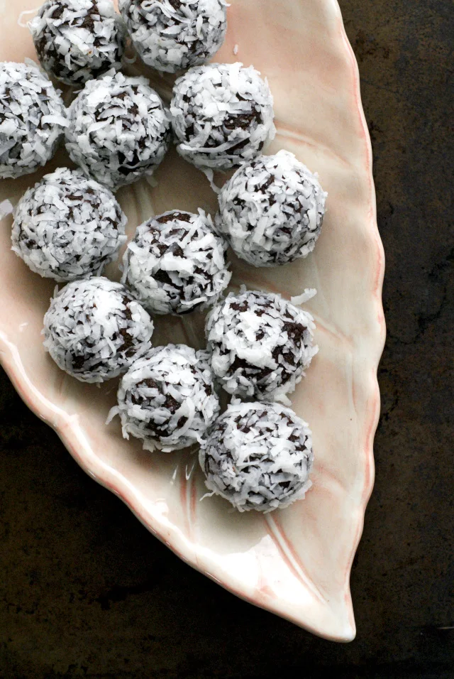 Healthy Coconut Fudge Balls rich chocolatey treats made with simple, whole, paleo approved ingredients.  They will satisfy even the most ravenous sweet tooth!