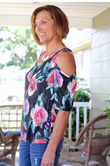 Simplicity 8337, view B, a cold shoulder look,  made from Mood Fabrics' floral jersey
