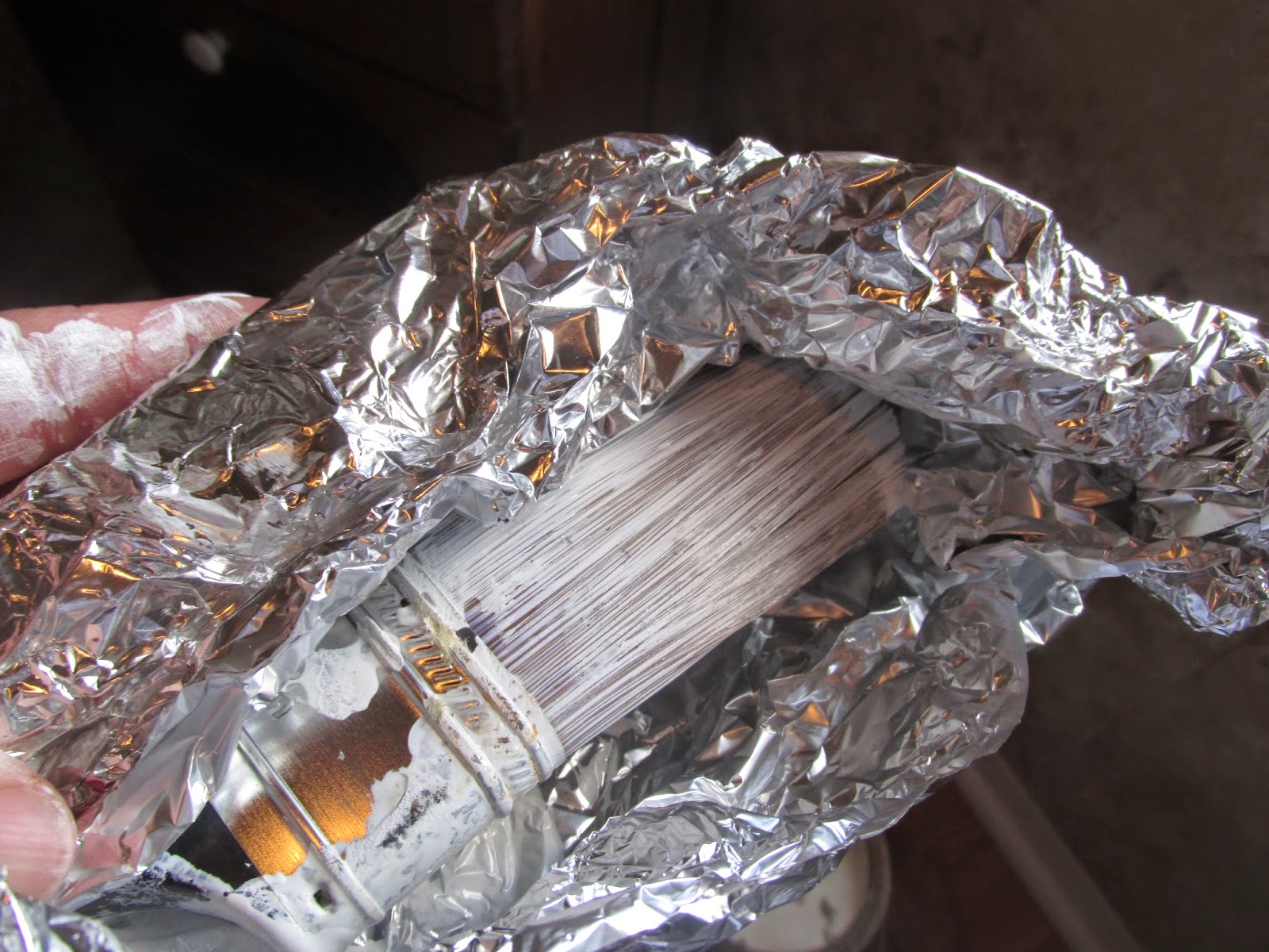 Using aluminum to wrap used paint brushes -never would have thought!  