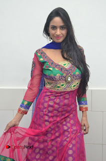 Actress Pooja Sri Pictures in Salwar Kameez at Cottage Craft Mela  0033
