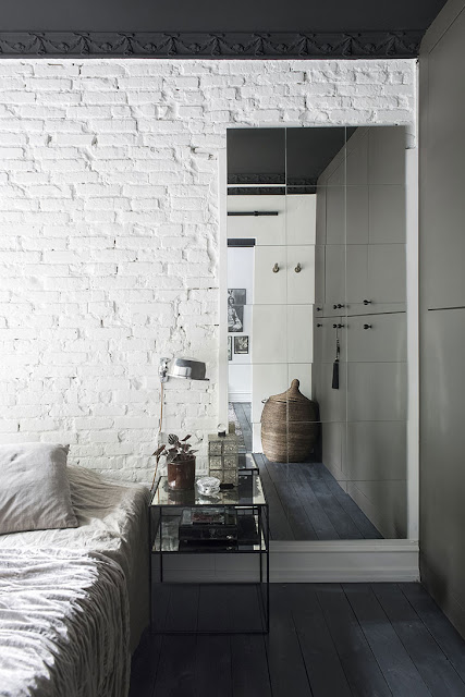 Black & White apartment in Copenhagen with interesting metallic contrasts