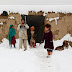 Afghan Children battle against cold and snow