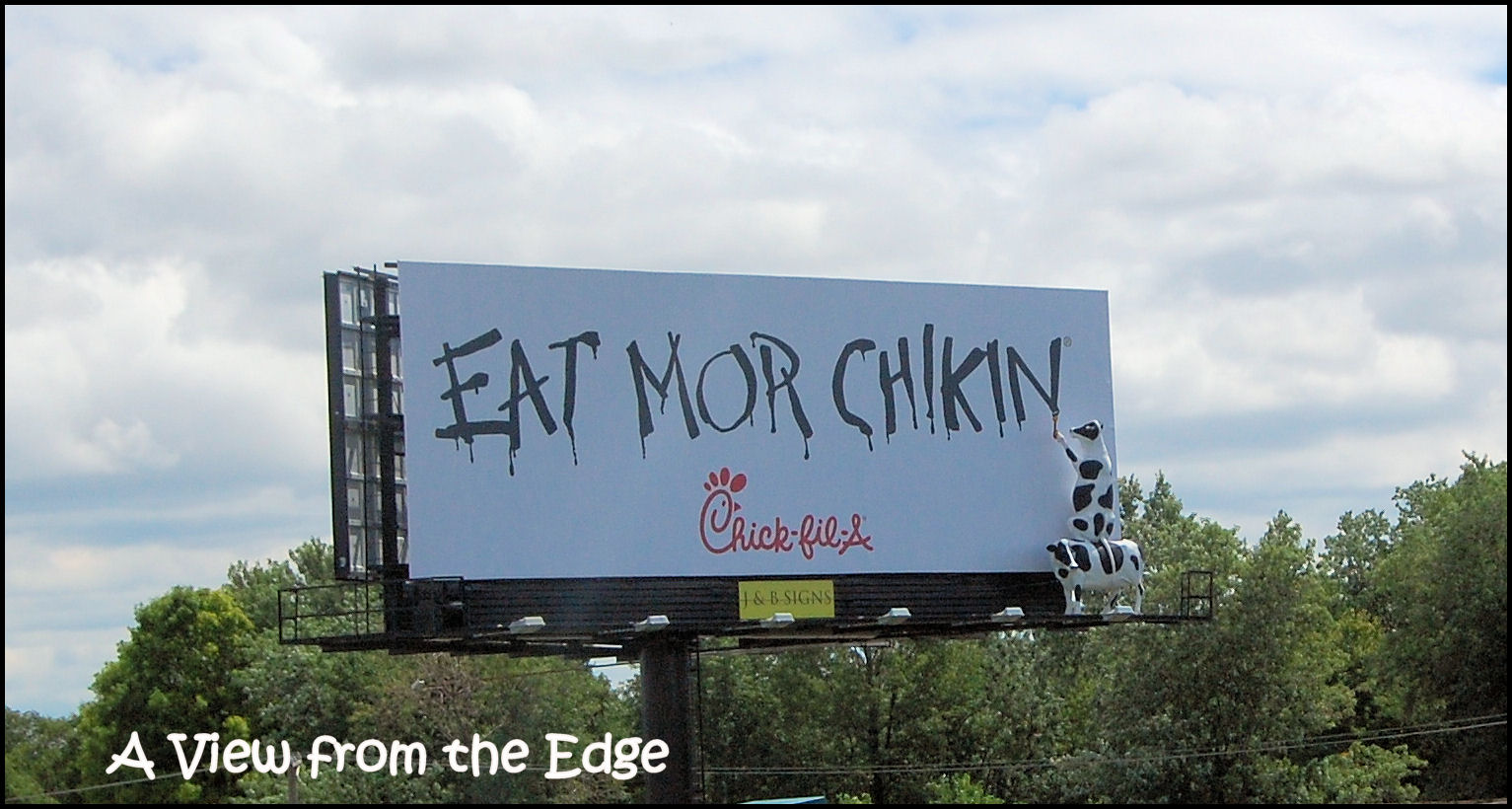 a-view-from-the-edge-signs-eat-more-chicken