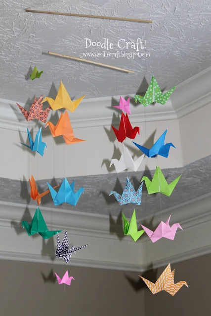 http://www.doodlecraftblog.com/2013/06/origami-flapping-paper-crane-mobile.html