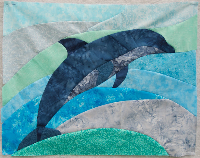 curved pieced dolphin
