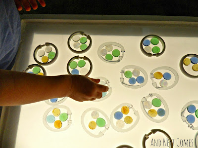 More grouping on the light table using shower curtain rings and glass stones from And Next Comes L