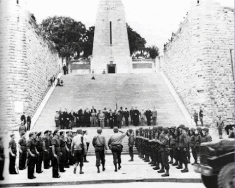Nazi German victory march past the Verdun Memorial to Victory in June, 1940