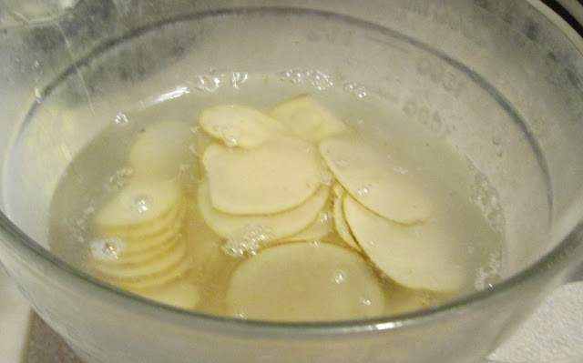 Making homemade potato chips recipe.