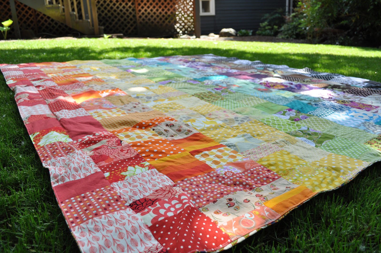 five to six: rainbow patchwork picnic blanket