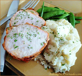 Tomato Crusted Pork Tenderloin, marinated in a tomato and wine sauce then either baked or grilled, for an easy weeknight dinner. | Recipe developed by www.BakingInATornado.com | #recipe #dinner #pork