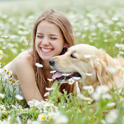 Girl playing with Pet