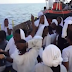 Nigerian migrants celebrates as the have their first sight of europe