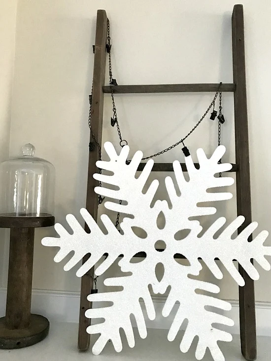 DIY mantel ladder and a glittery snowflake