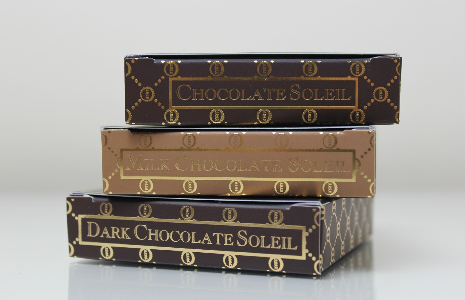 A picture of Too Faced Milk Chocolate Soleil, Chocolate Soleil and Dark Chocolate Soleil