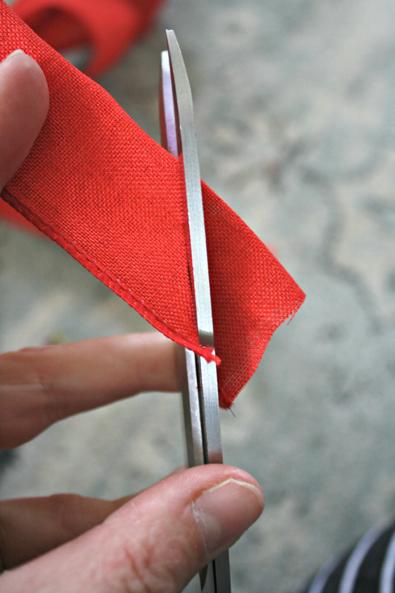 cutting "V" at end of ribbon