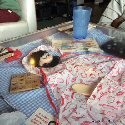 still-life under glass table at Saturn Cafe in Berkeley, California