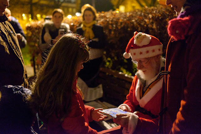 Dennis Erdwin in character as Father Christmas at MEOTRA's Carol Singing in the Square event