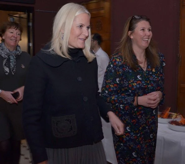 Women's Leadership for Sustainable Development. Princess Mette-Marit wore Prada Jacket, Prada boots and clutch