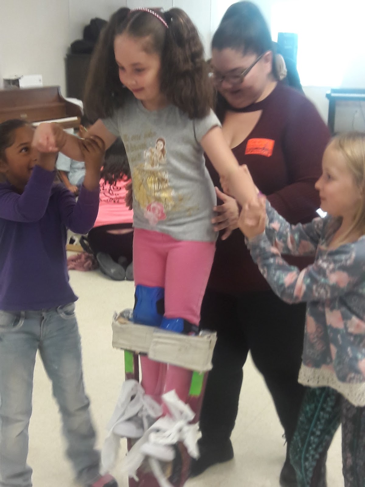 TISA Second Grade Dragons Our First Stilt Walking Class!