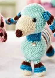 http://www.letsknit.co.uk/free-knitting-patterns/molly-and-max-dachshunds