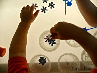 Sorting snowflakes on the light table from And Next Comes L