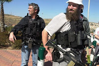 Armed Israeli settlers