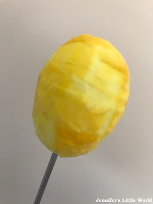 Egg covered in tissue paper craft