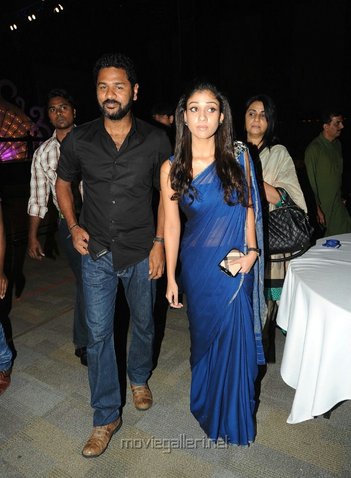  Nayanthara wearing Blue colour Georgette saree with stone brooch over the shoulder