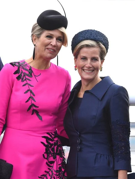 Queen Maxima wore OSCAR DE LA RENTA leaf patterned dress. Countess Sophie of Wessex wore Alexander McQueen dress