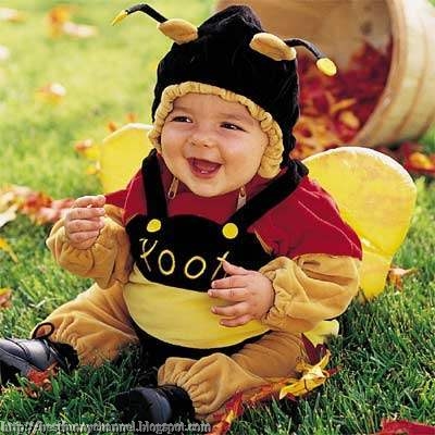 Funny baby in costume.