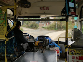 view from a Jumbo Wuzhou Bus heading away from Baishe Village (白社村) in Wuzhou