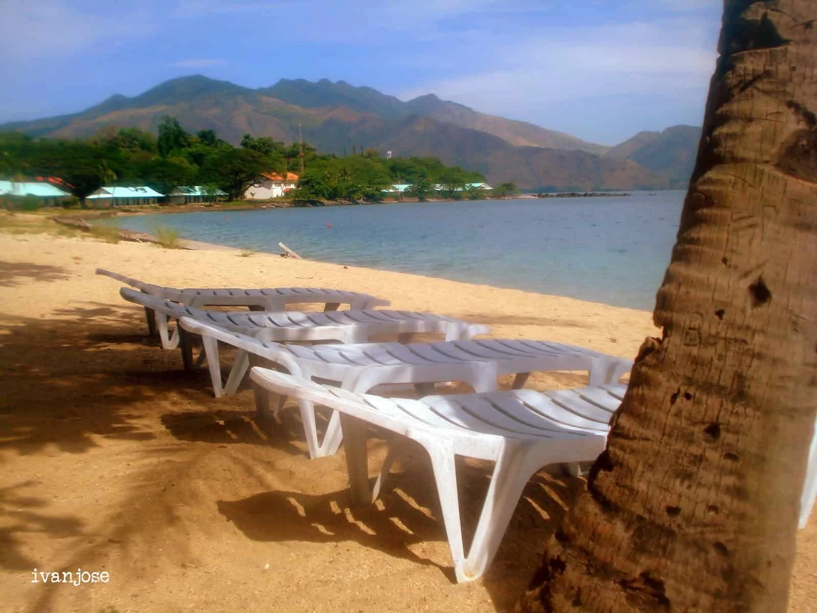 Beach benches at Grande Island Resort
