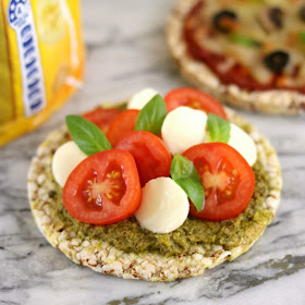 Real Foods Sorghum Thins with Pesto and Caprese Salad - Healthy Rice Cake Topping Ideas Recipes - Cherry Tomatoes, Bocconcini and Basil Leaves
