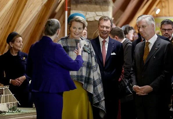 Queen Mathilde wore asymmetric yellow midi dress Natan aw2019 collection. The Queen wore a new asymmetric yellow midi dress by Natan